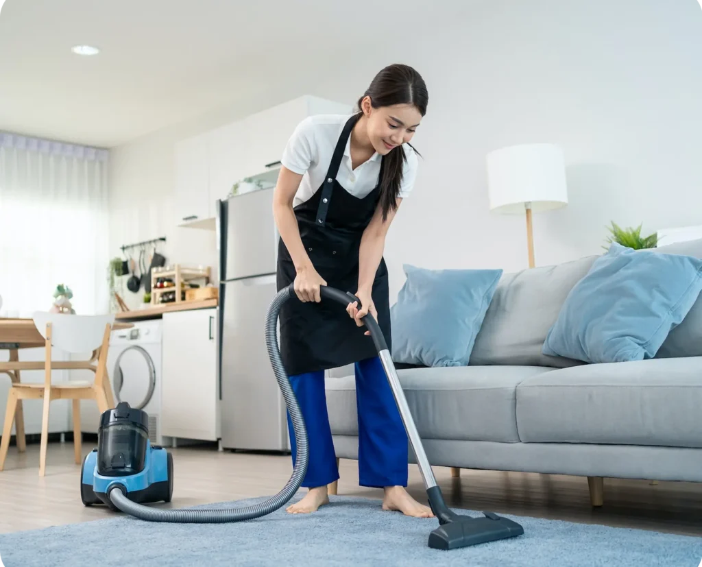 woman professional worker cleaning in living room