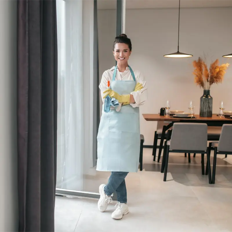 happy professional cleaner after completing professional cleaning services in Coquitlam