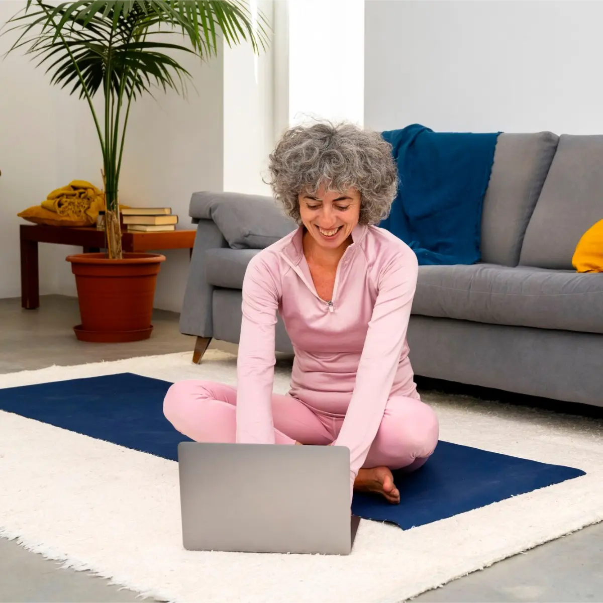 senior woman relaxing at home after having expert house cleaning services in Toronto