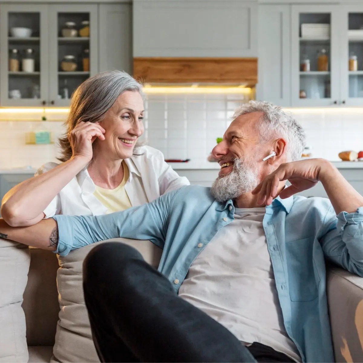 senior couple enjoying at home after receiving professional home cleaning for seniors