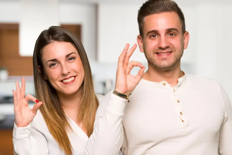 happy and satisfied couple after having professional house cleaning services in North Vancouver