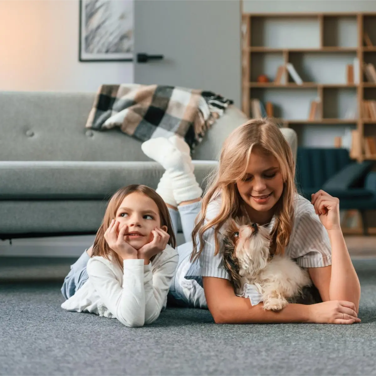 Kids and pets peacefully relaxing in a home after an eco-friendly cleaning