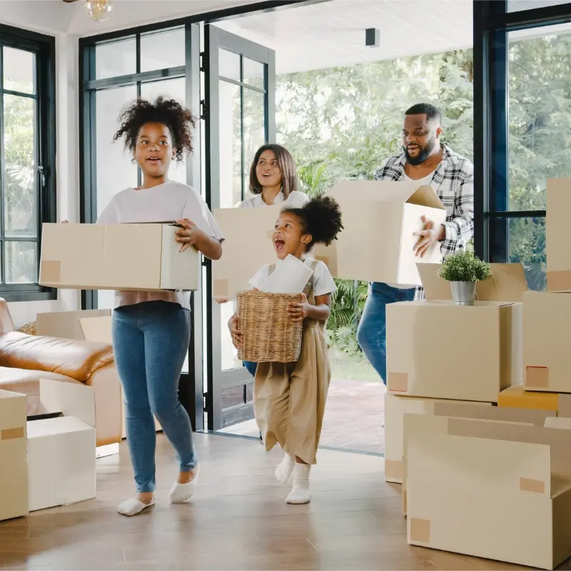 happy family moving out of house with boxes, ready for move out cleaning