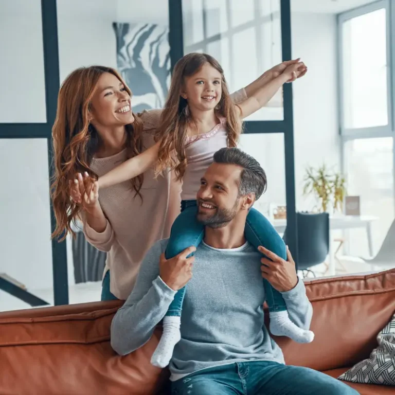 happy family enjoying in Canada home after Mesh Maids professional house cleaning services