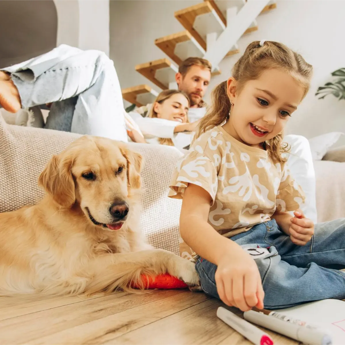 Family enjoying quality time together in a spotless living room after taking cleaning services in Abbotsford