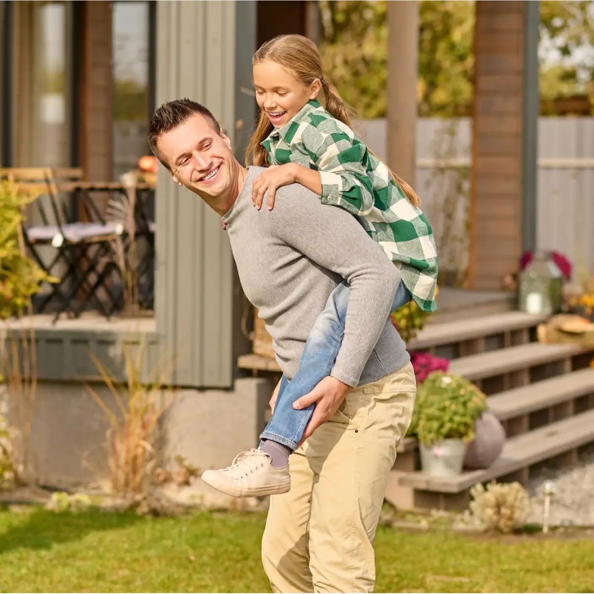 kid enjoying with her father after eco-friendly cleaning services in Richmond