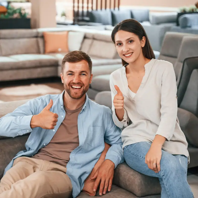 happy and satisfied couple at home after house cleaning services in Surrey