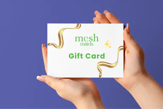Young woman holding Mesh Maids gift card for cleaning services in Maple Ridge