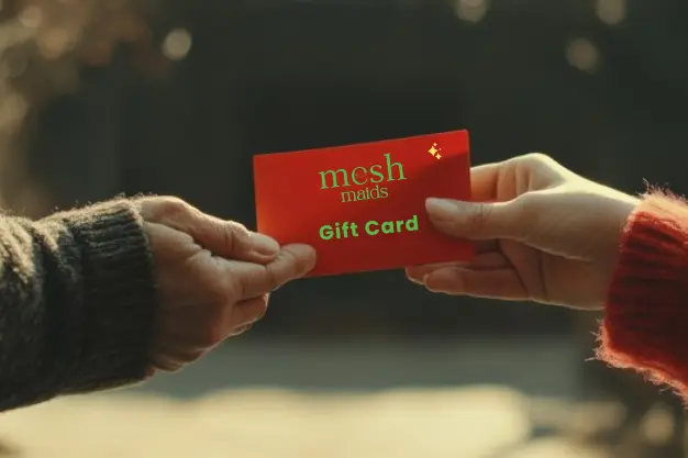 Woman giving Mesh Maids gift card to her love one for cleaning services in Vaughan