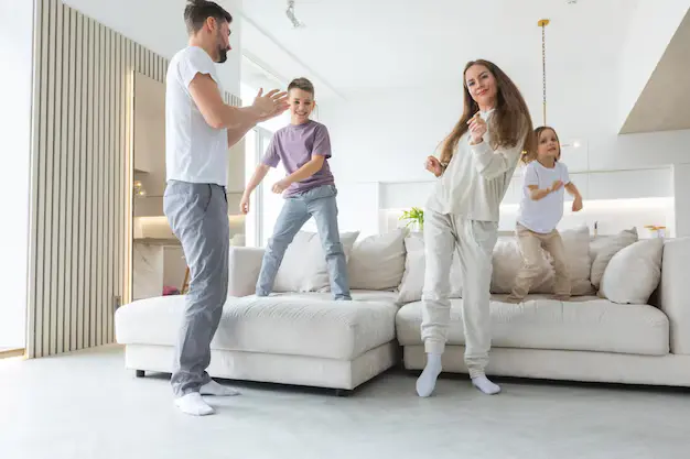 Happy family enjoying at a clean home after professional house cleaning services in Calgary