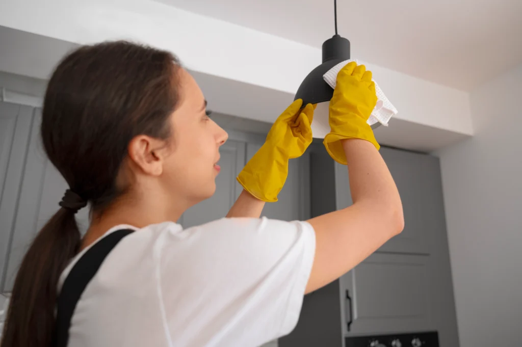 Cleaning electrical fixtures and appliances during post-construction cleaning