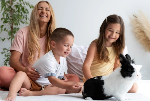 Parents and kids enjoying at a clean home after hiring Mesh Maids house cleaning services in Surrey, White Rock and Delta