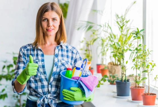 Female Mesh Maids cleaning supplies during house cleaning services in Richmond