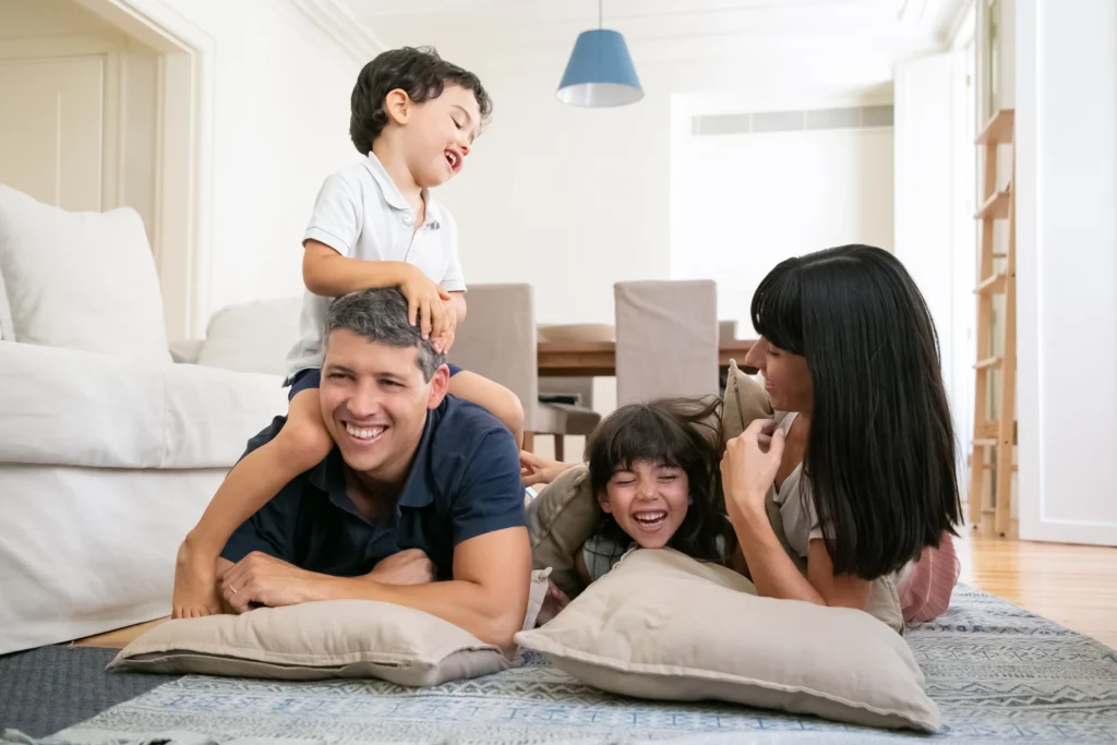 Parents and kids enjoying at a clean home after hiring Mesh Maids house cleaning services in North Vancouver and West Vancouver